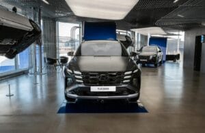 a couple of cars parked in a garage